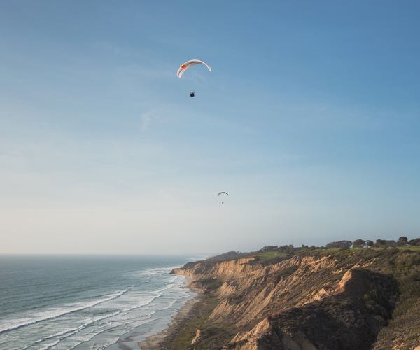 Paragliders over Torrey Pines State Beach