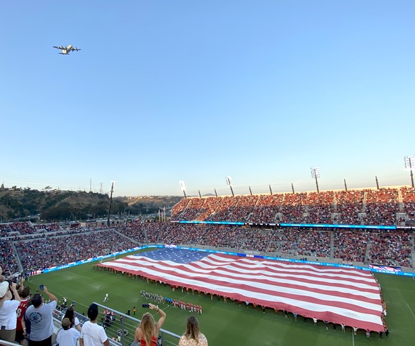 Opening of a soccer game with the American Flag at Snapdragon Stadium