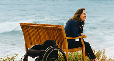 Utilizing an accessible wheel chair to get close to the ocean in San Diego CA