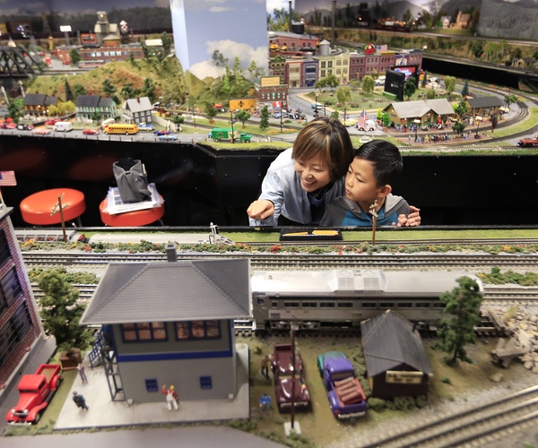 Mother and son at the Model Railroad Museum in Balboa Park San Diego