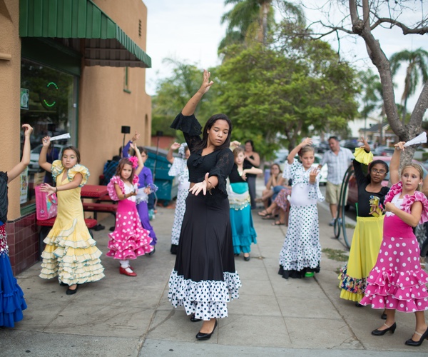Group of Dancers performing on the sidewalks of South Park San Diego