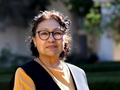 Writer and translator Lilia O'Hara is pictured outdoors in San Diego.