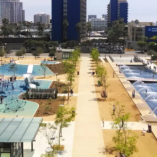 Aerial view of grass, playground and fountains at Waterfront Park in downtown San Diego