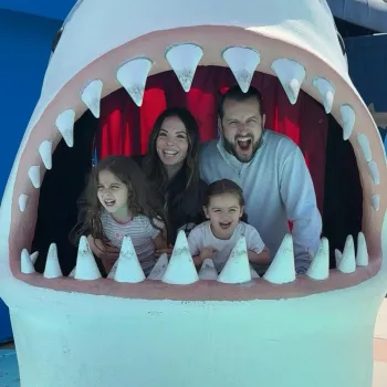 alexandra lourdes and her family at the birch aquarium inside one of the sharks all making scary silly faces