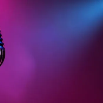 A vintage-style microphone is shown under purple and blue stage lights with a dark, blurred background.