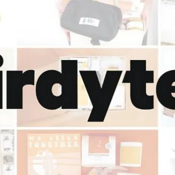 Large black text "Birdytell" appears over a collage of various gift boxes and packaged products arranged in a grid background.