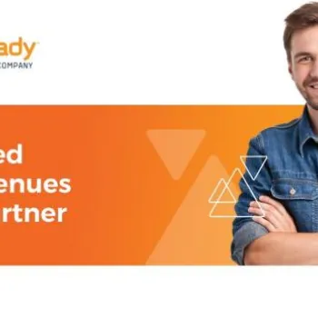 A man in a denim shirt stands smiling with arms crossed next to an orange banner that reads, "Your Trusted Events & Venues Staffing Partner.