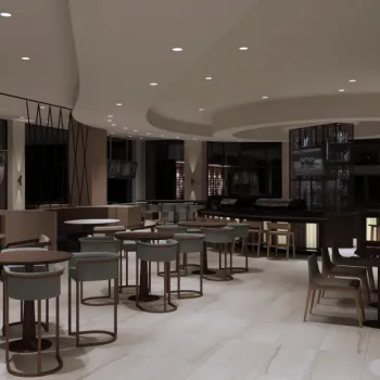 Modern, dimly lit restaurant interior with several empty tables and chairs, light tile flooring, and minimalistic decor.