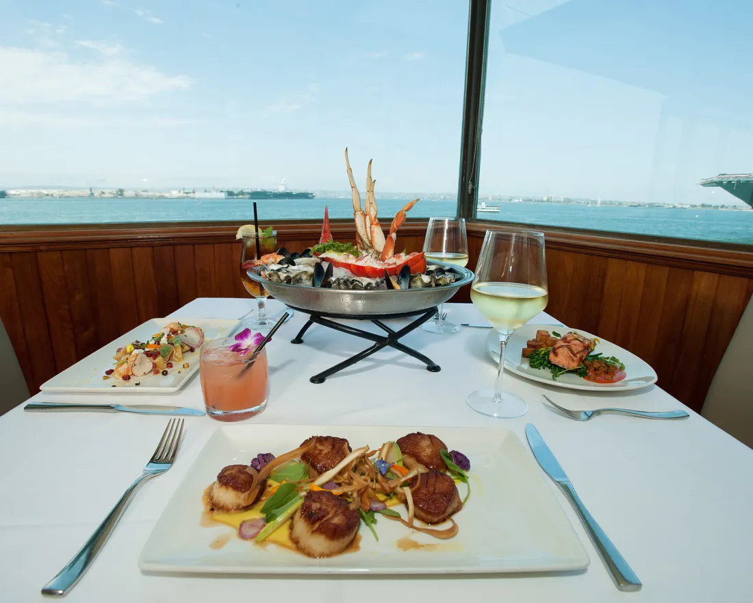 Seafood plates at Top of the Market restaurant overlooking San Diego Bay