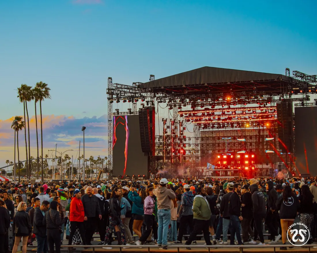 The crowd at CRSSD Festival in the fall during a sunset in San Diego