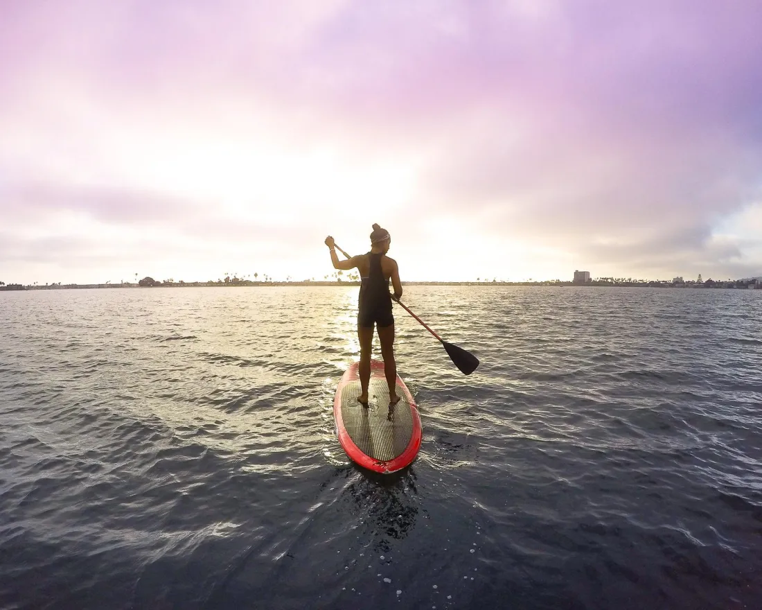 A woman on the paddle board in Mission Bay in San Diego