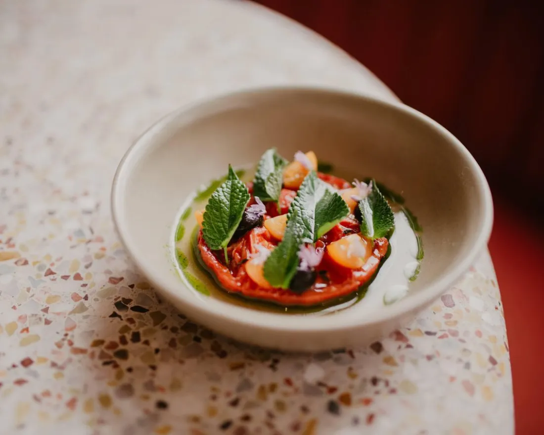 A specialty dish is displayed at Jeune et Jolie restaurant in Carlsbad, CA.