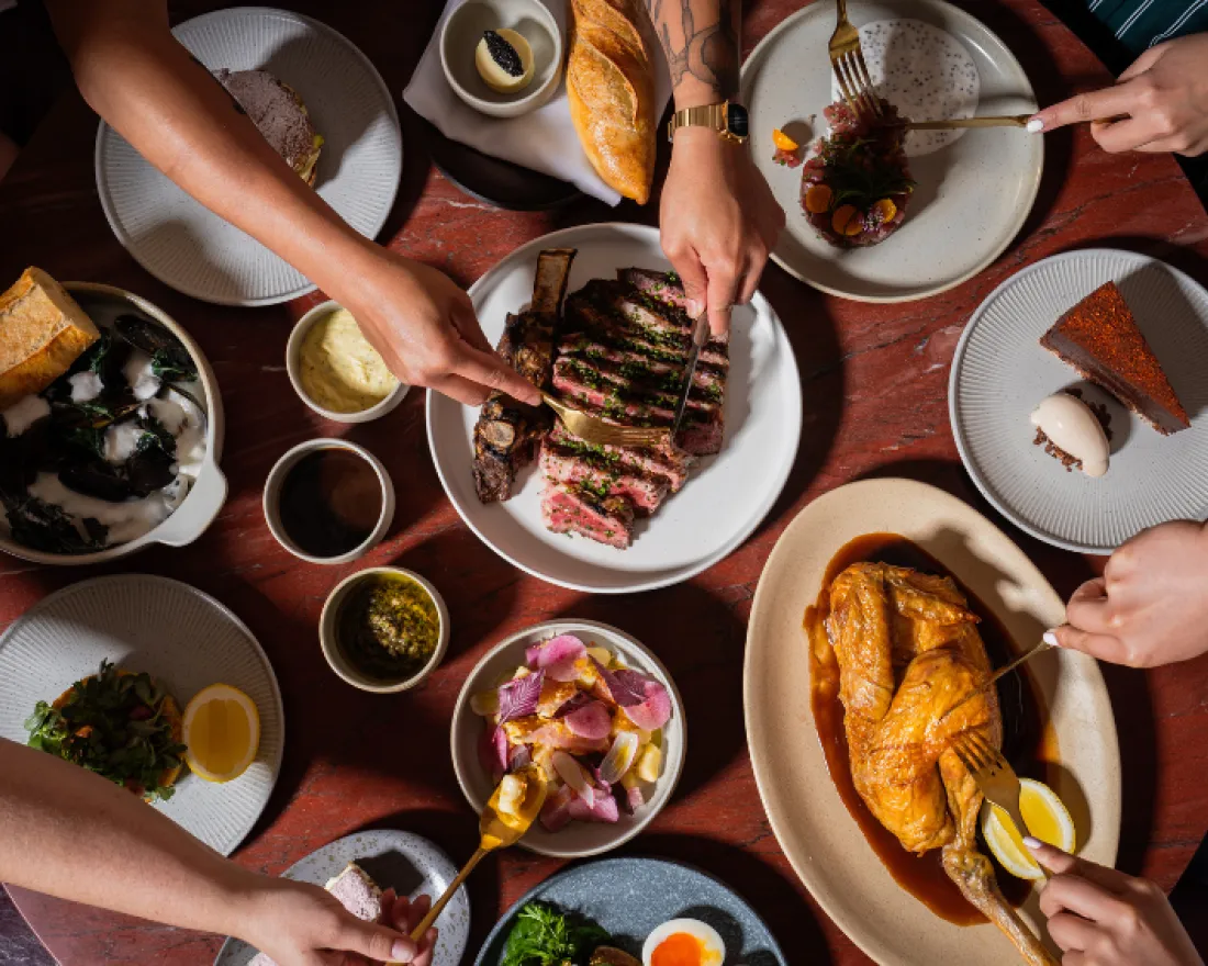 Flat lay of dishes from Le Coq