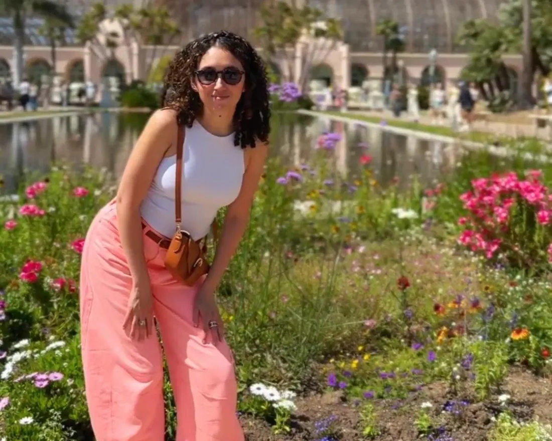 Gerry Isabelle in front of the botanic building in Balboa Park in San Diego 