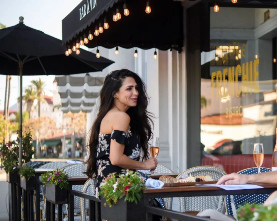 People dine outside of Little Frenchie on Coronado Island in San Diego, CA