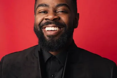 A close-up photo of writer Ramel J. Wallace.