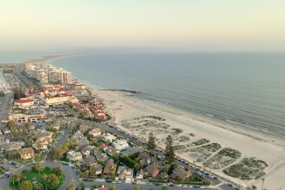 Aerial of Coronado Beach with the sand dunes that spell out Coronado
