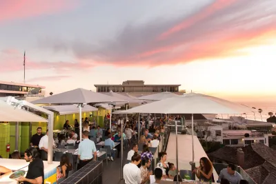 Every table is packed with diners enjoying the food, sunset and oceanfront view at George's at the Cove in San Diego's La Jolla