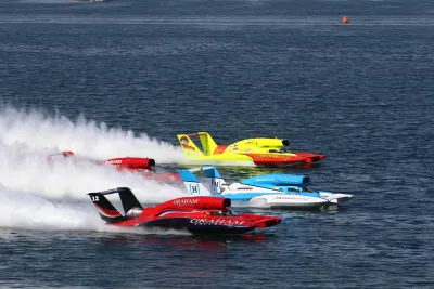 Boats racing on the water in Mission Bay during Bayfair taking place on a sunny day in San Diego CA