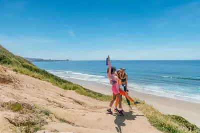 A group of women hiking in La Jolla Torrey Pines Nature Reserve in San Diego