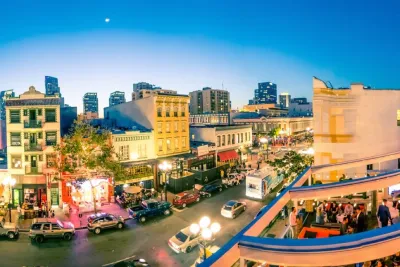 Dusk setting with panoramic views of downtown San Diego from the rooftop of Rustic Root