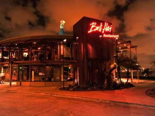 Street view of Bali Hai Restaurant at night.