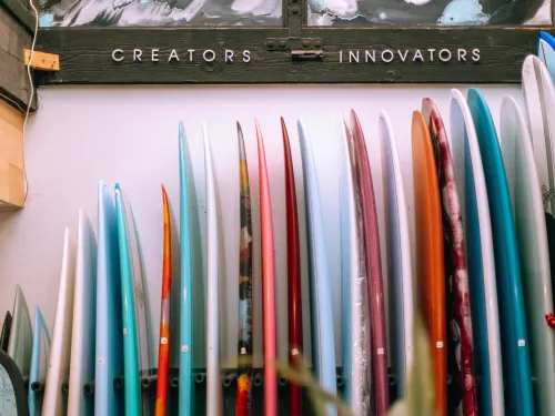 Colorful surf boards in Bird Rock Surf Shop in San Diego