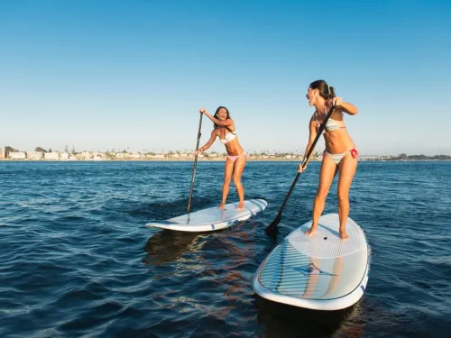 Two girls on SUPs