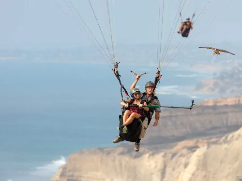 women gladding through the air