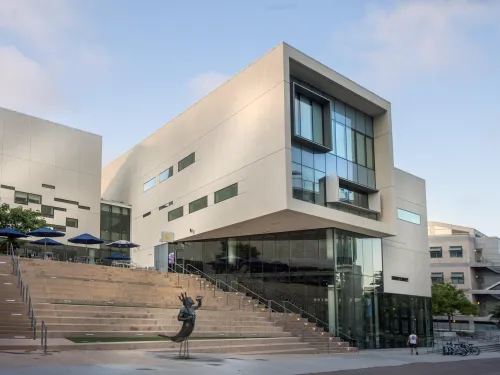 The Price Center form UC San Diego, a concrete building with a lot of windows. 