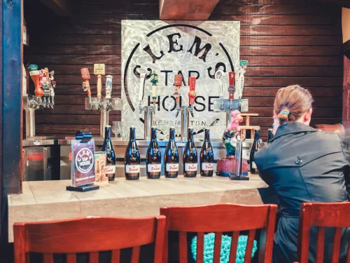 Patron at the bar of Clem's Tap House in Kensignton