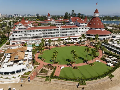 Aerial of the Hotel del Coronado and it's famous red roof with the San Diego skyline in the background
