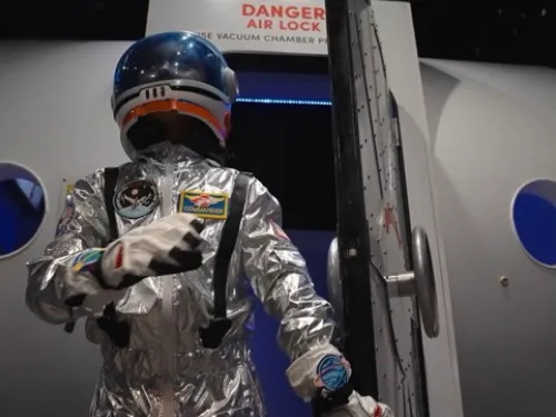 Space suit outside of a air lock at the San Diego Air & Space Museum