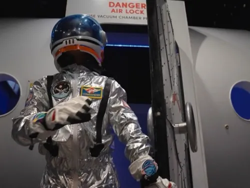 Space suit outside of a air lock at the San Diego Air & Space Museum