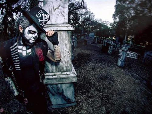 A man with scary halloween make up waiting for someone to scare at Balboa Trails in San Diego