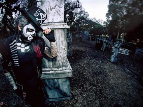 A man with scary halloween make up waiting for someone to scare at Balboa Trails in San Diego