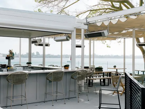 A view of Malibu Farm restaurant in San Diego, showing a daytime view of San Diego Bay.