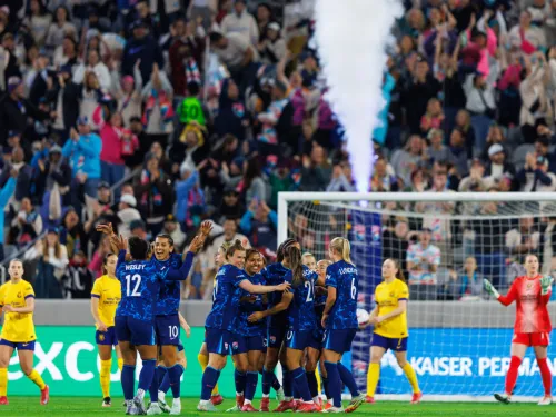 The San Diego Wave FC Women's Soccer Team on the Snapdragon Stadium celebrating. 