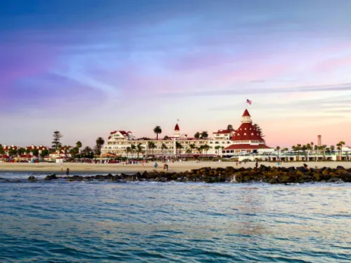 View of Hotel Del Coronado from the ocean at sunset