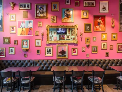 Wall of photos at Lucha Libre Taco Shop on Washington Street in San Diego, CA