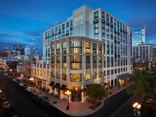 Corner hotel of Pendry San Diego at dusk in Downtown